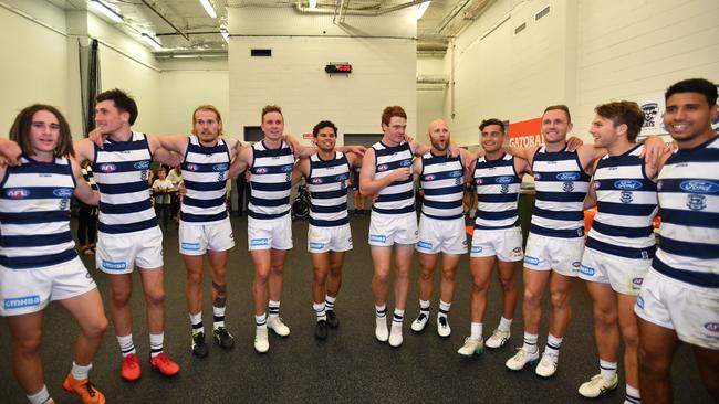 Cats players sing the club song after beating the Crows at Adelaide Oval. Picture: AAP Image/David Mariuz