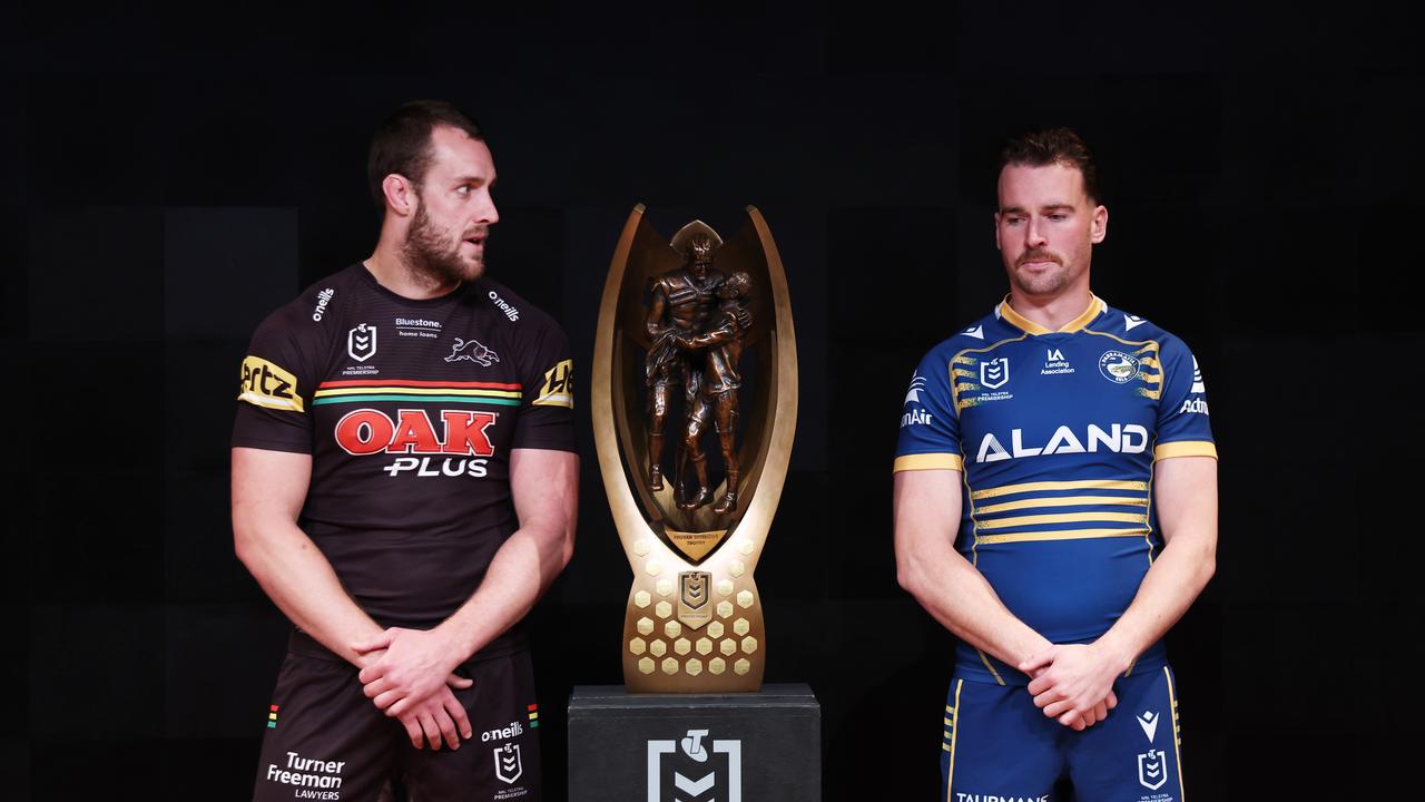 SYDNEY, AUSTRALIA - SEPTEMBER 05: NRL captains participating in the 2022 NRL Finals Series Isaah Yeo of the Penrith Panthers (L) and Clint Gutherson of the Parramatta Eels (R) pose with the NRL Premiership Trophy during the 2022 NRL Finals Series Launch at Telstra on September 05, 2022 in Sydney, Australia. (Photo by Matt King/Getty Images)