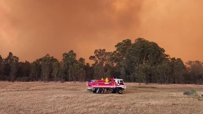 21/12/2024 North Hamilton Rural Fire Brigade members watch over a bushfire in the Grampians: Picture North Hamilton Rural Fire Brigade/Facebook, ,