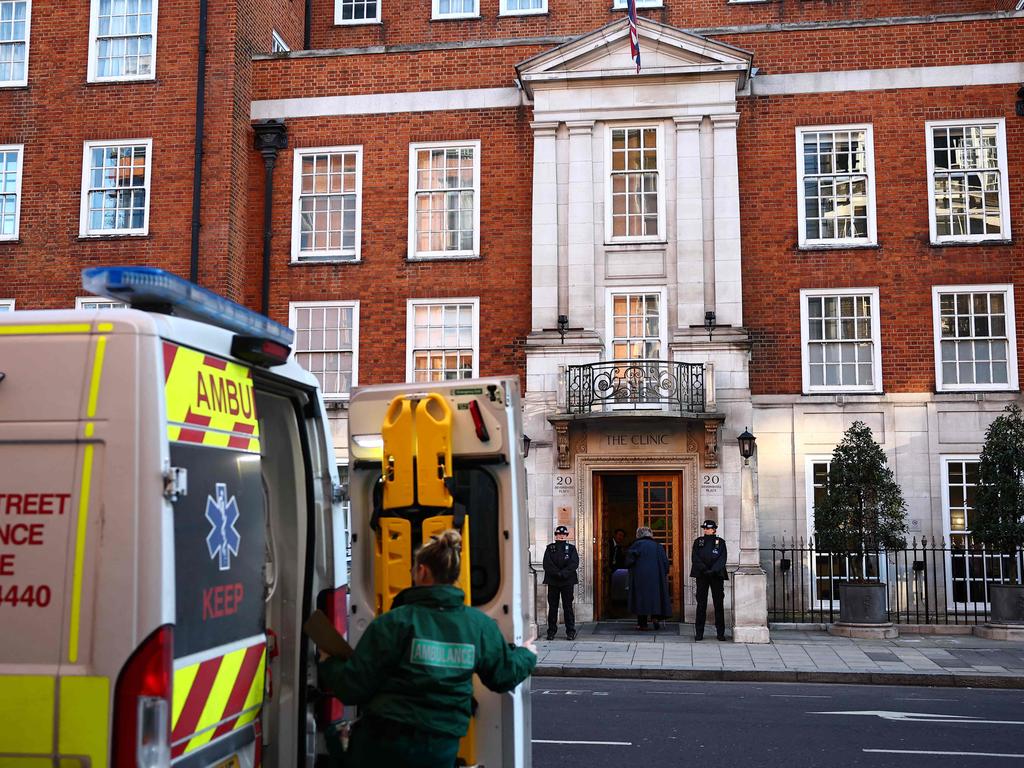 Guards watch over the entry at the London Clinic, where Kate is currently recovering. Picture: Henry Nicholls/AFP