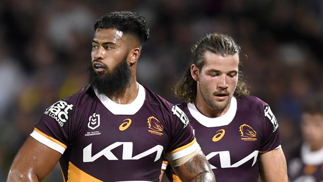 Broncos teammates Payne Haas and Pat Carrigan will be on opposite sides on Wednesday night.