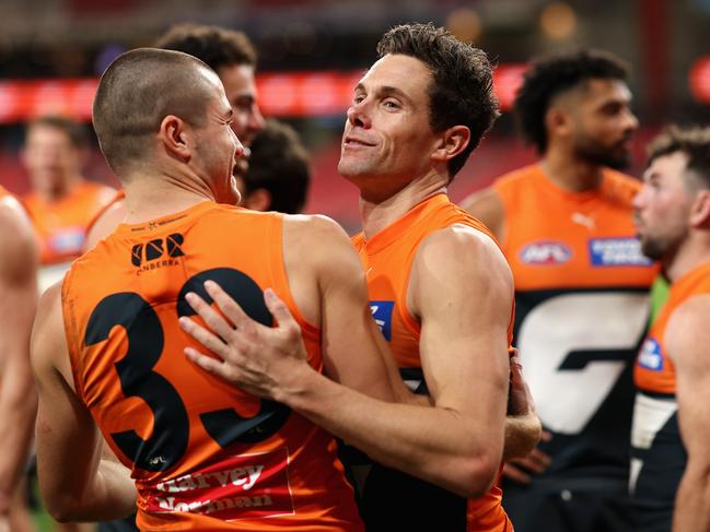 SYDNEY, AUSTRALIA – JUNE 16: Josh Kelly of the Giants is embraced by Xavier O'Halloran of the Giants after winning the round 14 AFL match between Greater Western Sydney Giants and Port Adelaide Power at ENGIE Stadium, on June 16, 2024, in Sydney, Australia. (Photo by Cameron Spencer/Getty Images)