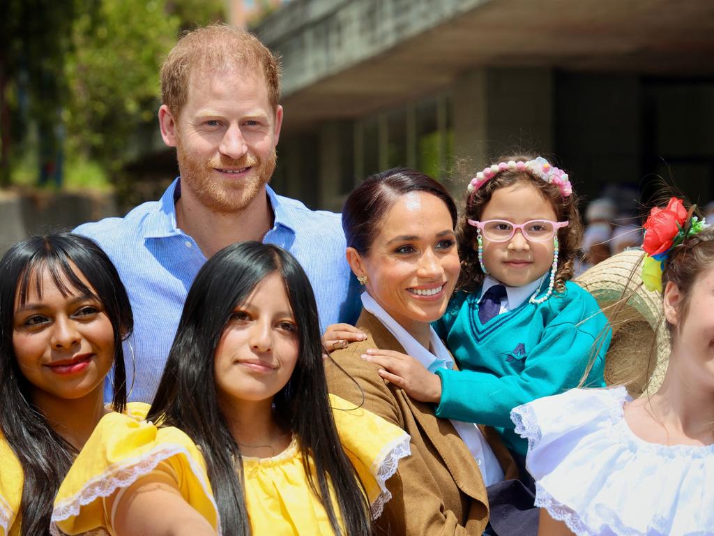 The Sussexes with students of the La Giralda School in Bogota. Picture: AFP