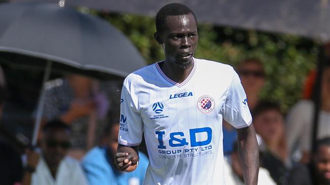 MELBOURNE, AUSTRALIA - FEBRUARY 10 2024 Kenjok Athiu of Dandenong City during the NPL Victoria game between Avondale v Dandenong City at Reggio Calabria Club.Picture: Brendan Beckett