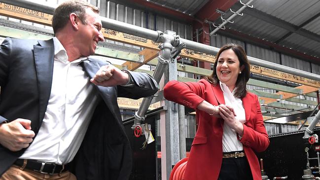 Queensland Premier Annastacia Palaszczuk bumps elbows with her deputy Steven Miles during Labor’s campaign launch in Brisbane. Picture: NCA NewsWire / Dan Peled