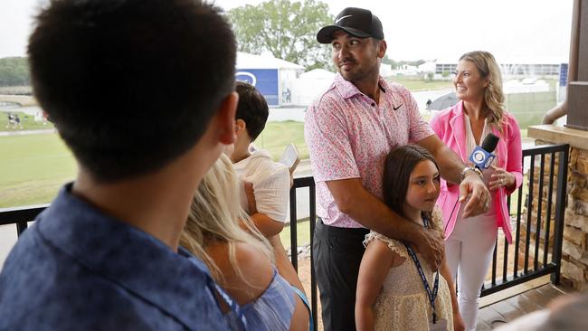 Jason Day celebrates with his family. Picture: Mike Mulholland / Getty Images via AFP