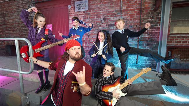 School of Rock cast members (from back left) Remy Grunden, 10, Ethan Stephenson, 12, Stephanie Kipnis, 10, Caleb Elbourne, 10, (froont row) Brent Hill and Hudson Sharp, 12. Picture: Alex Coppel