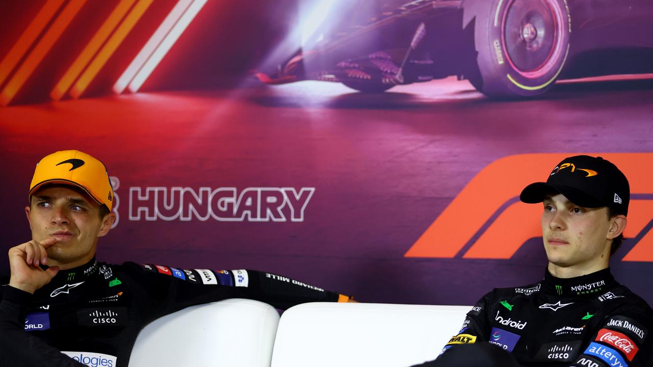 BUDAPEST, HUNGARY - JULY 21: Race winner Oscar Piastri of Australia and McLaren and Second placed Lando Norris of Great Britain and McLaren attends the press conference after the F1 Grand Prix of Hungary at Hungaroring on July 21, 2024 in Budapest, Hungary. (Photo by Bryn Lennon/Getty Images)