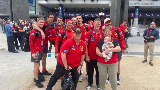Bubs at the game with the big kids. Image: Supplied