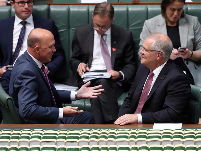 Home Affairs Minister Peter Dutton with the Prime Minister Scott Morrison during Question Time in the House of Representatives. Picture: Gary Ramage 