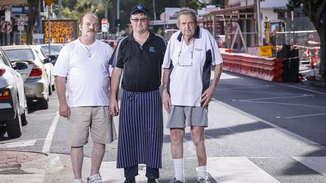 Holger Schinz from Sunbeam Cakes, butcher Paul Beaumont and baker Bill Fuller say their businesses are losing thousands of dollars during the shopping strip revamp. Picture: Wayne Taylor