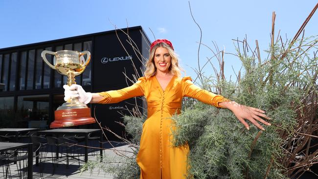 Georgia Connolly holds the Melbourne Cup. Picture: Alex Coppel.