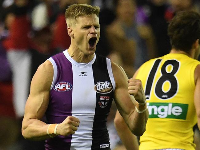 Nick Riewoldt of the Saints (left) reacts after kicking a goal during the Round 16 AFL match between the St.Kilda Saints and the Richmond Tigers at Etihad Stadium in Melbourne, Saturday, July 8, 2017. (AAP Image/Julian Smith) NO ARCHIVING, EDITORIAL USE ONLY