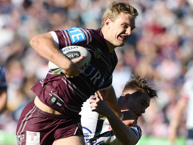 Tom Trbojevic of the Sea Eagles runs through with the ball to score a try during the Round 22 NRL match between the Manly-Warringah Sea Eagles and the Sydney Roosters at Lottoland in Sydney, Sunday, August 6, 2017. (AAP Image/David Moir) NO ARCHIVING, EDITORIAL USE ONLY