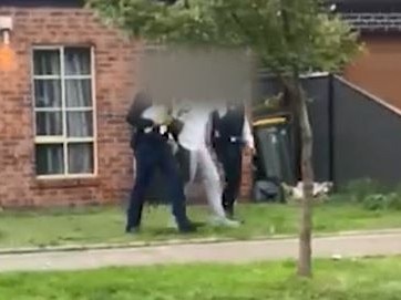 the arrest of five people after the fatal stabbing in Docklands last week., ,  , , The footage shows the arrest of  the 19-year-old Derrimut man., ,