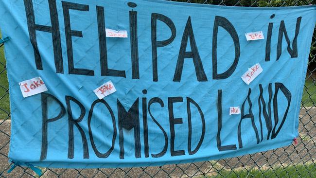 A sign on the soccer fields leading into Bellingen in opposition to the proposed helipad at the Hermes Estate on Promised Land Rd, Gleniffer.