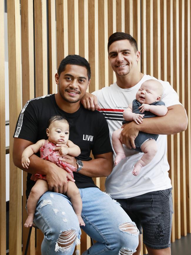 Anthony Milford with daughter Ariana and Kodi Nikorima with son Zavier. Picture: AAP Image/Claudia Baxter