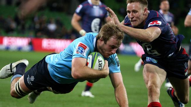 Will Miller dives over to score for the Waratahs against the Rebels last month.