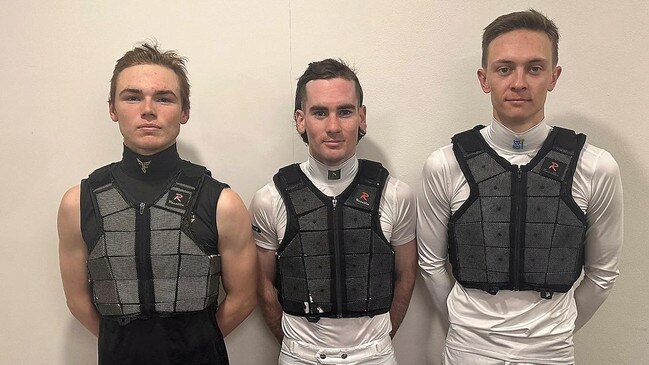 Apprentice jockeys Jasper Franklin, Tyler Schiller and Dylan Gibbons in their jockey vests at Rosehill.