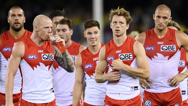 Dejected Swans players after their loss to the Tigers last weekend. Picture: Getty Images