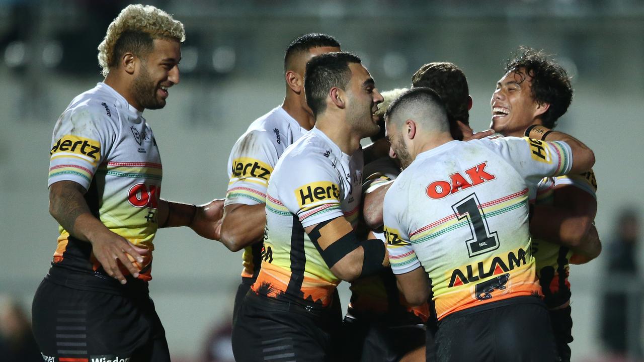 Nathan Cleary is mobbed by his Panthers teammates