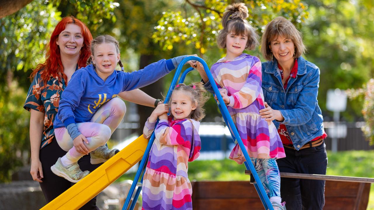 The brown family sends their daughter Kayley (middle) to Saturday kinder, which is taught by early childhood teacher Grace Keleher (left). Picture: Jason Edwards