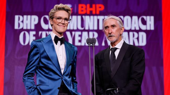 Master of Ceremonies Brihony Dawson with Malcolm Hales of the Arnhem Crows Football Club after winning the BHP Community Coach of the Year Award during the 2024 W Awards. Picture: Dylan Burns/AFL Photos via Getty Images