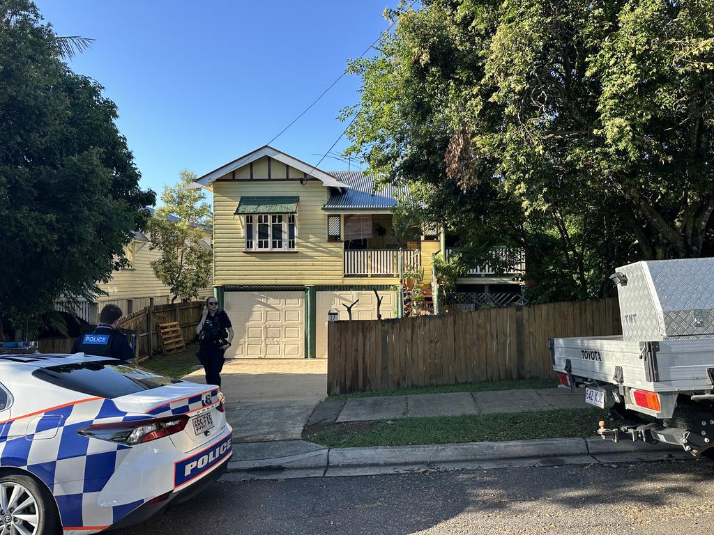 Police at a house in Annerley where it's alleged pipe bombs were detonated.