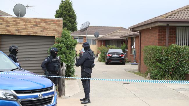 Police outside the Dallas unit. Picture: Alex Coppel