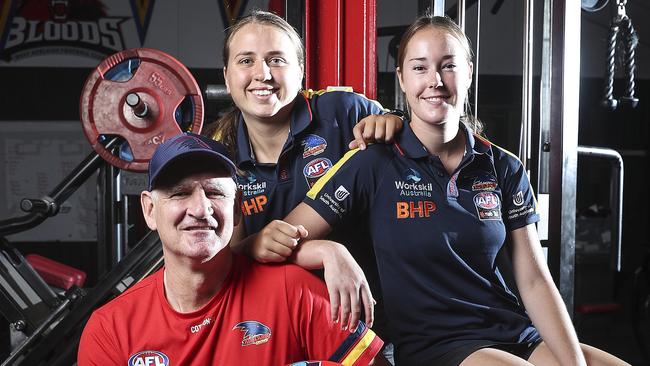 AFLW – Former Crows player and West Adelaide Coach Mark Mickan back with the Crows as AFLW ruck coach – with West Adelaide players and Crows players Chelsea Biddle and Madison Newman at the Westies clubrooms. Picture SARAH REED