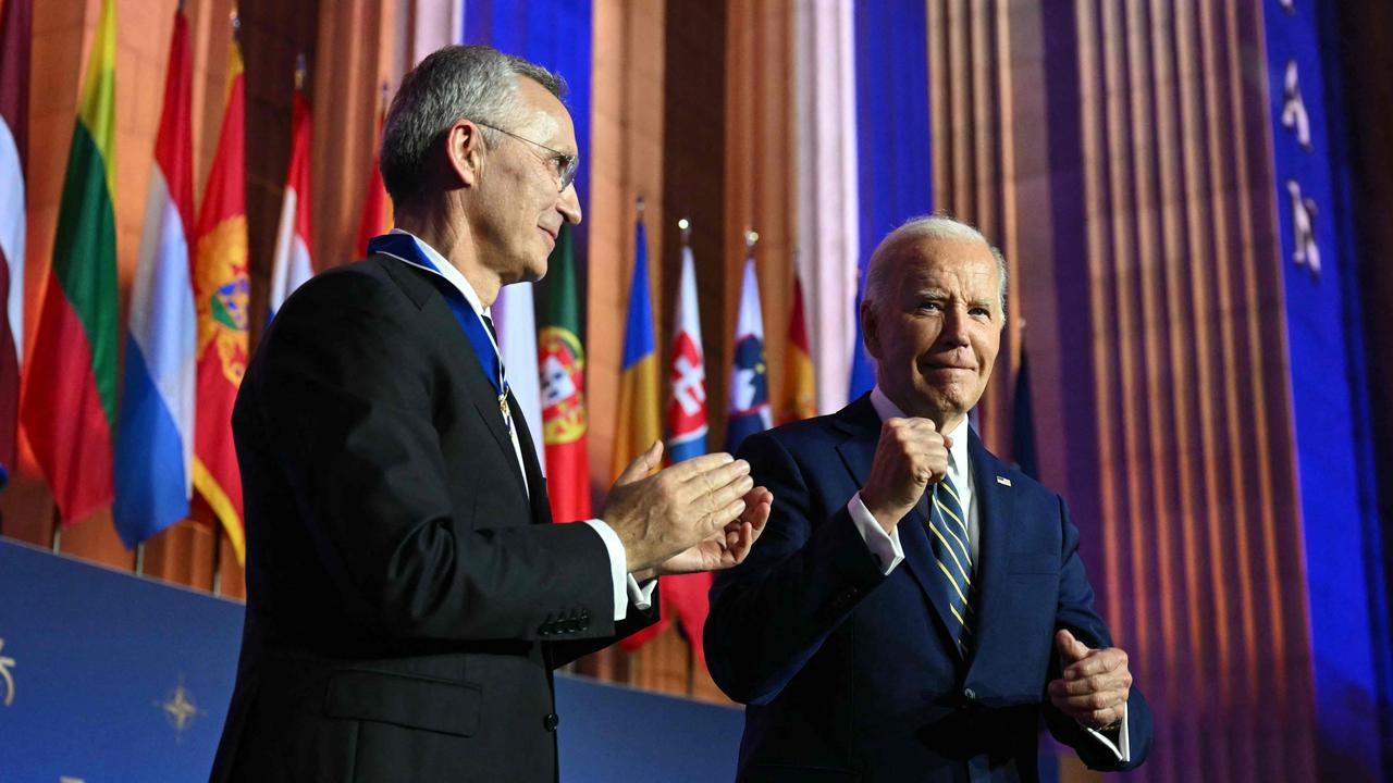 US President Joe Biden reacts after awarding the Presidential Medal of Freedom to NATO Secretary General Jens Stoltenberg. Picture: AFP