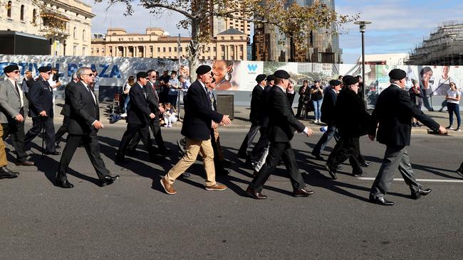 Last year’s crowdless Anzac Day march along North Terrace and King William Street. Picture: NCA NewsWire / Kelly Barnes