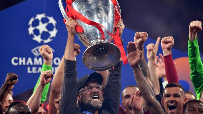 Liverpool manager Jurgen Klopp lifts the trophy after his team won the 2019 UEFA Champions League final against Tottenham in Madrid. Picture: AFP