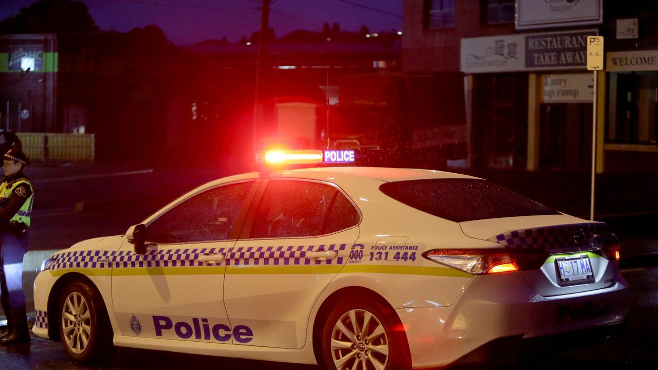 Generic Tasmania Police car. Tas Police. Tasmania Police. Logo. Police lights. Night. dark. Car Crash. Accident. Rain. Picture: PATRICK GEE