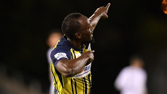 Usain Bolt celebrates scoring for the Central Coast Mariners on Friday night. Picture: AAP