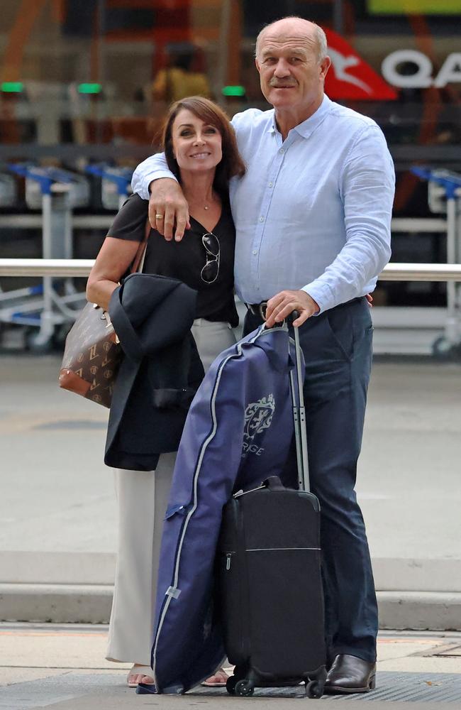 Wally Lewis and partner Lynda Adams at Brisbane Airport. Picture: MEDIA-MODE