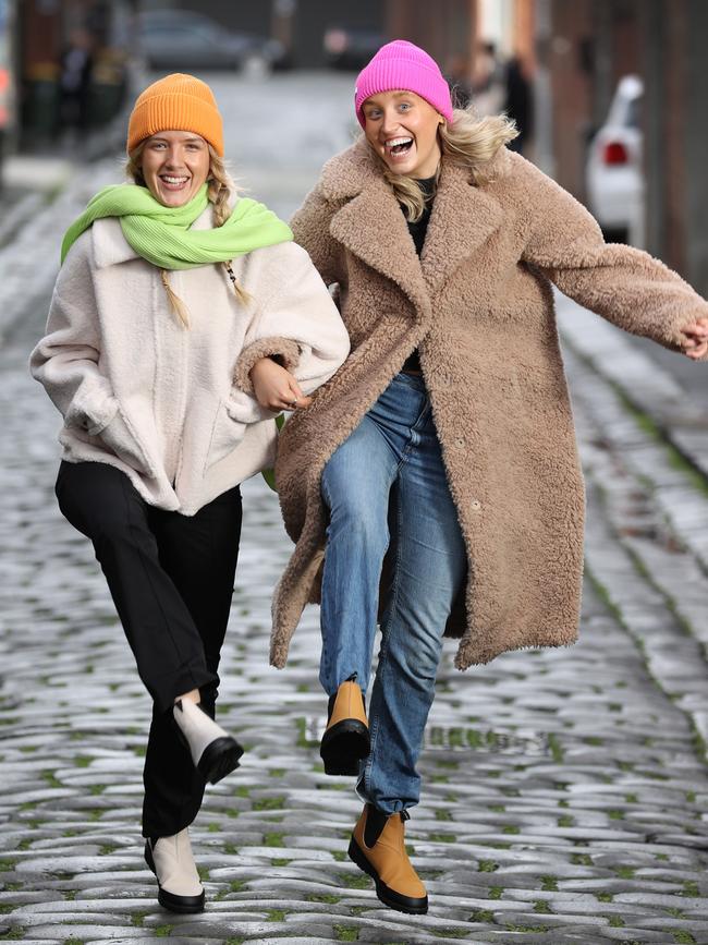 Models Ailish Dempsey Belle Pollard, outfitted in Rollie Nation Rubberised Chelsea Boots ready to jump puddles. Picture: David Caird