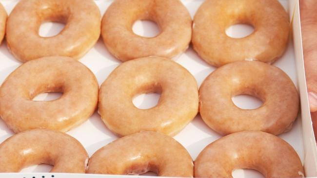 Krispy Kreme stores across Queensland are giving away 100,000 free original glazed doughnuts for this year's Doughnut Day.