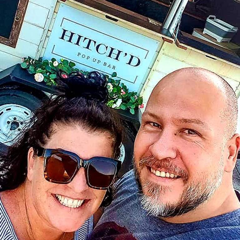 Melonie Vujicic with her husband, outside her new business.