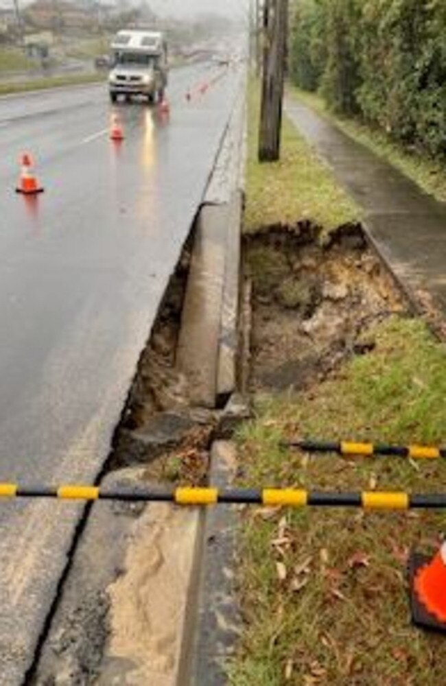 A burst water main has caused a hole to emerge on Warringah Rd, Narraweena. Picture: Sydney Water.