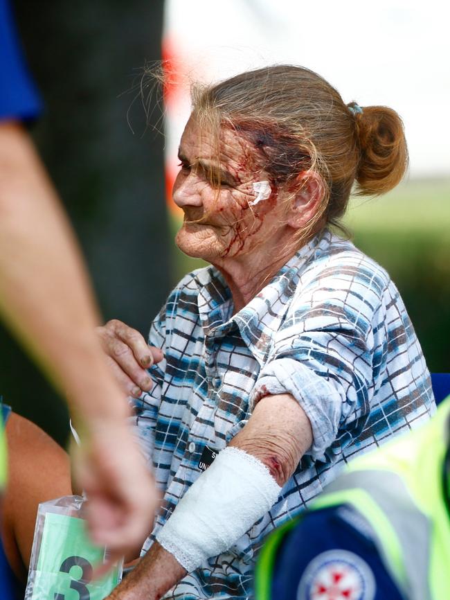 Injured passenger Peggy Case is treated following the crash. Picture: Dylan Robinson