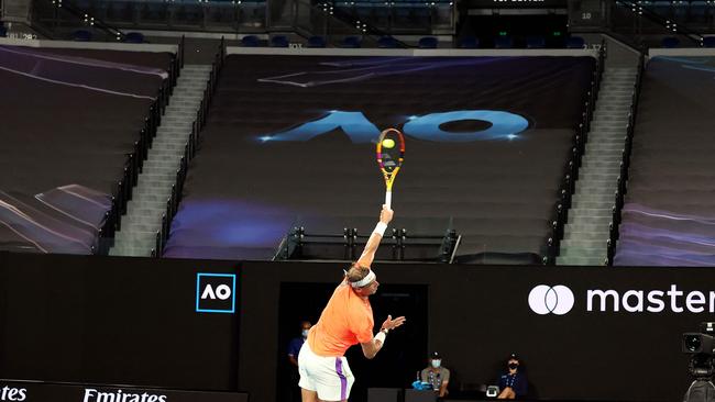 Rafael Nadal serves it up in front of an empty stadium. Picture: AFP