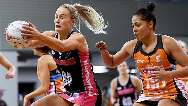 Chelsea Pitman of the Thunderbirds escapes from Giants defender Kristiana Manu'a.