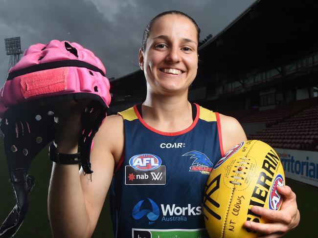 Adelaide Crows footballer Heather Anderson has been given permission to wear a pink helmet during the football games.