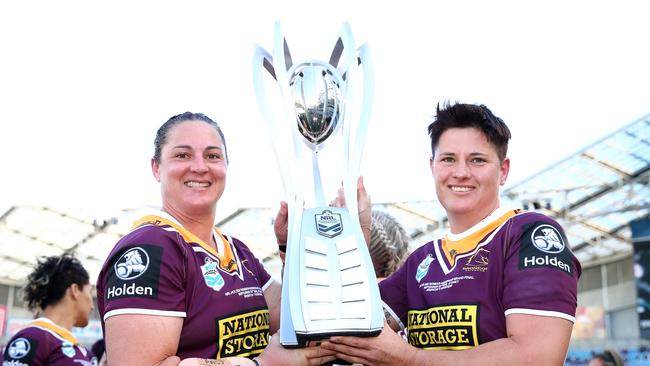 Stephanie Hancock and Heather Ballinger with the NRLW trophy.