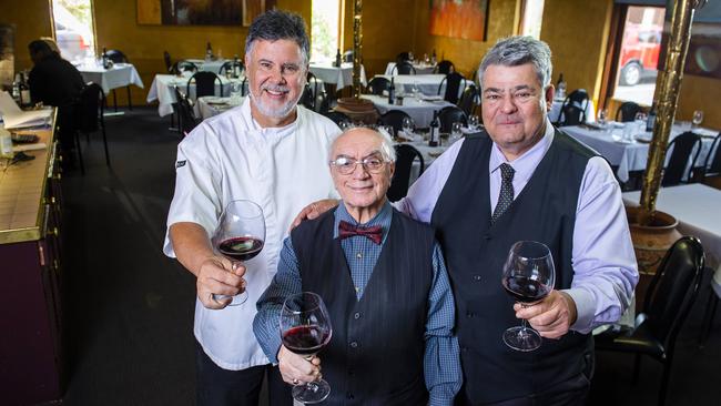 SA restaurant Cork and Cleaver owner Stratos Pouras (centre) with his head chef Greg Favretto and manager Jim Boutsis who have worked their for most of their lives and are retiring when the Cork and Cleaver closes its doors for the final time after almost 44 years. Picture Mark Brake