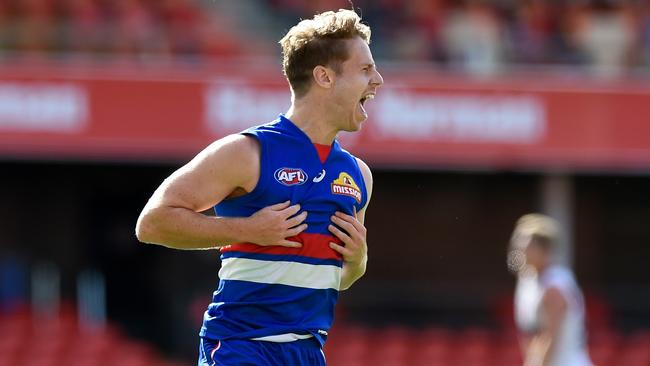 Lachie Hunter shows he’s Bulldogs “through and through” after kicking a goal against Adelaide. Picture: Matt Roberts/AFL Photos/via Getty Images