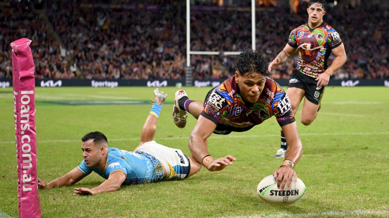 Brisbane, Australia. May 18, 2023. Selwyn Cobbo of the Broncos scores a try  during the NRL Round 12 match between the Brisbane Broncos and the Penrith  Panthers at Suncorp Stadium in Brisbane