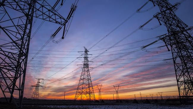 The silhouette of the evening electricity transmission pylon. Istock