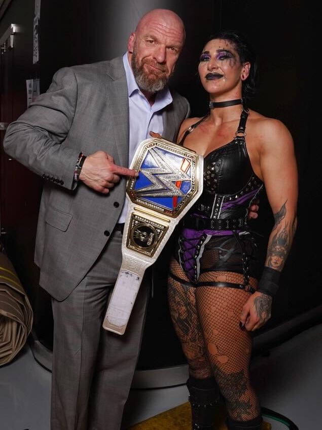 WWE legend Triple H with newly crowned Smackdown Women's Champion Rhea Ripley. Picture: WWE